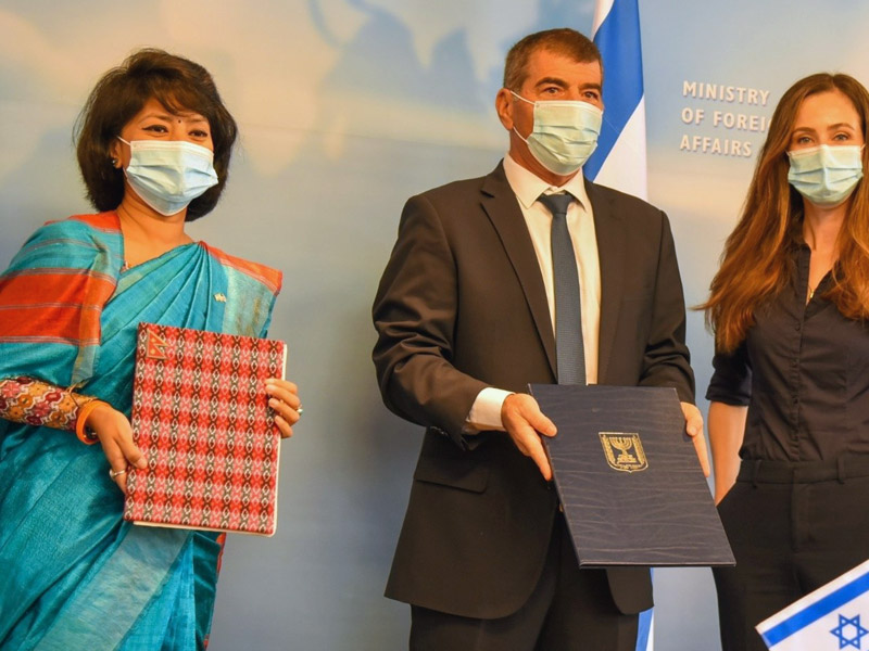 FM Ashkenazi with Nepalese Ambassador H.E. Anjan Shakya (left) at the signing ceremony.